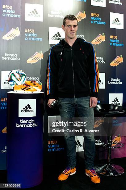 Real Madrid football player Gareth Bale presents the new "adizero f50" Adidas boots at Estadio Santiago Bernabeu on March 13, 2014 in Madrid, Spain.