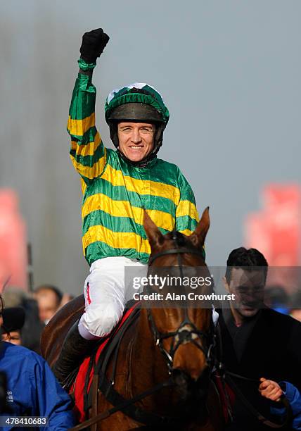 Barry Geraghty riding More Of That celebrates after winning The Ladbrokes World Hurdle Race on St Patrick's Thursday during the Cheltenham Festival...