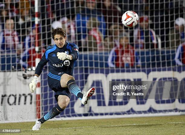 Troy Perkins of Montreal Impact kicks the ball back into play against the FC Dallas at Toyota Stadium on March 8, 2014 in Frisco, Texas.