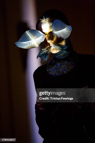 Model stands during the Little Shilpa presentation at the Freemasons Hall during London Fashion Week AW14 at on February 16, 2014 in London, England.