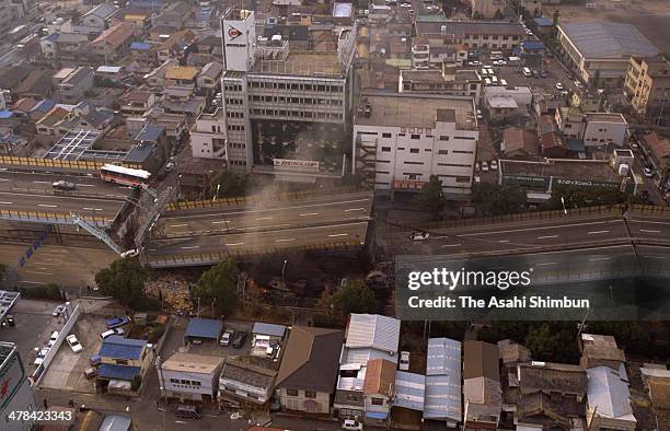 In this aerial image, the elevated Hanshin Expressway collapses after the strong earthquake on January 17, 1995 in Nishinomiya, Hyogo, Japan....