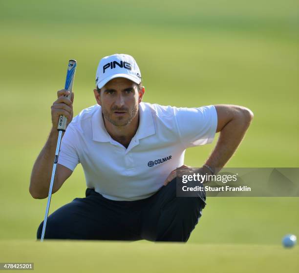 Alejandro Canizares of Spain lines up a putt during the first round of the Trophee du Hassan II Golf at Golf du Palais Royal on March 13, 2014 in...