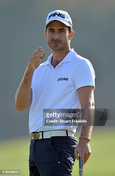 Alejandro Canizares of Spain reacts to a putt during the first round of the Trophee du Hassan II Golf at Golf du Palais Royal on March 13, 2014 in...