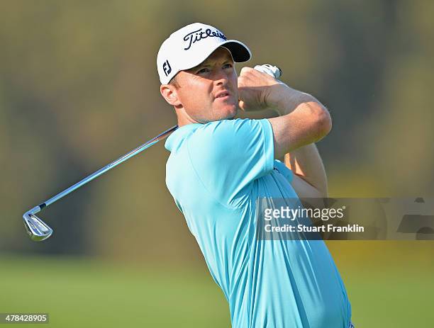 Michael Hoey of Northern Ireland plays a shot during the first round of the Trophee du Hassan II Golf at Golf du Palais Royal on March 13, 2014 in...