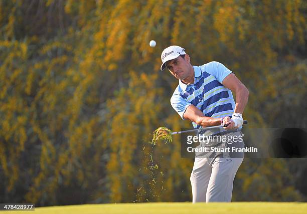 Rafael Cabrera Bello of Spain plays a shot during the first round of the Trophee du Hassan II Golf at Golf du Palais Royal on March 13, 2014 in...