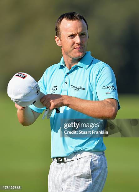 Michael Hoey of Northern Ireland ponders a shot during the first round of the Trophee du Hassan II Golf at Golf du Palais Royal on March 13, 2014 in...