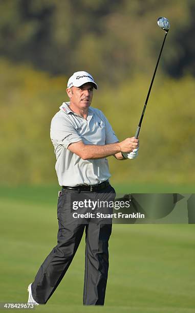 Paul McGinley of Ireland plays a shot during the first round of the Trophee du Hassan II Golf at Golf du Palais Royal on March 13, 2014 in Agadir,...