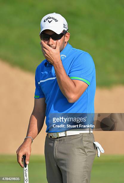 Pablo Larrazabal of Spain reacts to a putt during the first round of the Trophee du Hassan II Golf at Golf du Palais Royal on March 13, 2014 in...
