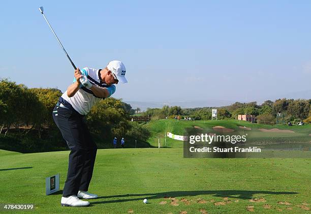 Mikko Ilonen of Finland plays a shot during the first round of the Trophee du Hassan II Golf at Golf du Palais Royal on March 13, 2014 in Agadir,...
