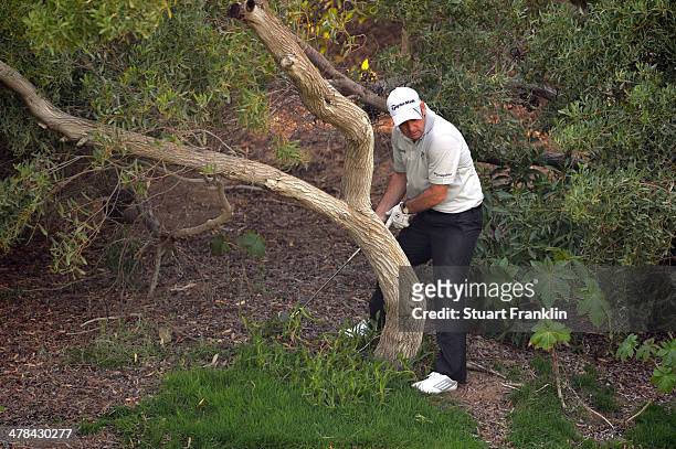 Paul McGinley of Ireland plays a shot during the first round of the Trophee du Hassan II Golf at Golf du Palais Royal on March 13, 2014 in Agadir,...