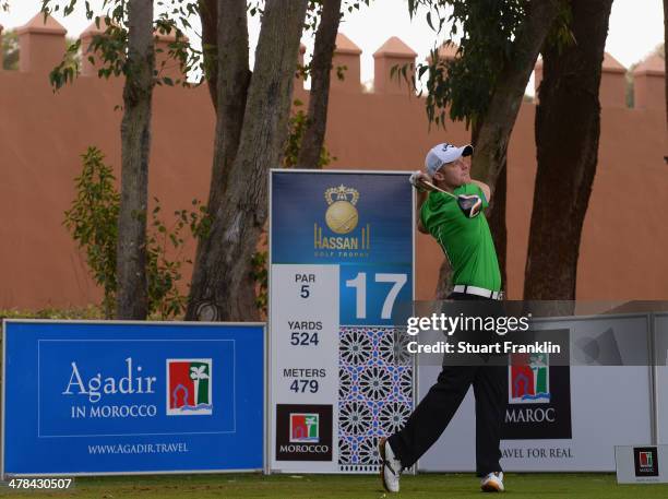 David Horsey of England plays a shot during the first round of the Trophee du Hassan II Golf at Golf du Palais Royal on March 13, 2014 in Agadir,...