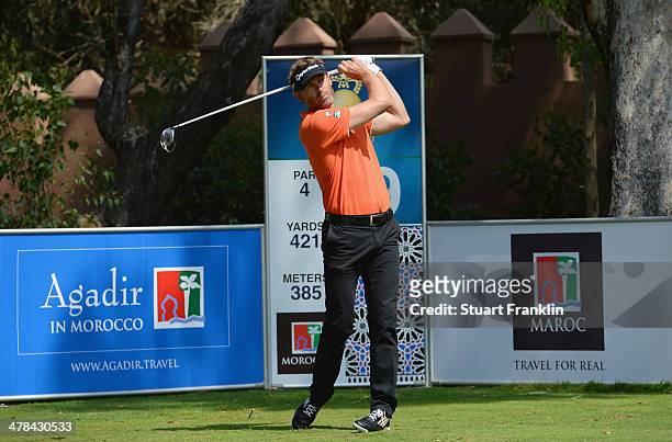 Raphael Jacquelin of France plays a shot during the first round of the Trophee du Hassan II Golf at Golf du Palais Royal on March 13, 2014 in Agadir,...