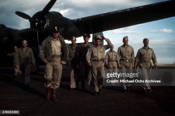 Military servicemen depart a plane at the US Army and Air Force base on Ascension Island a British Overseas Territory. A Joint US Air Force base and...