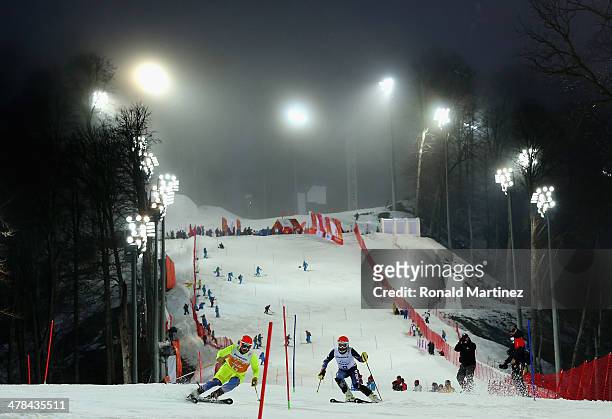 Mark Bathum of the United States and guide Cade Yamamoto compete in the Men's Slalom 2nd Run - Visually Impaired during day six of Sochi 2014...