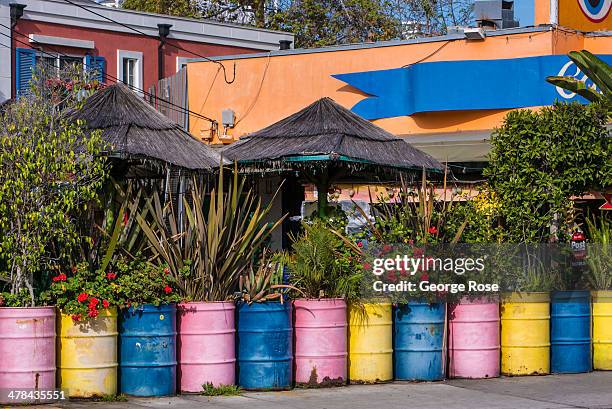 Colorfully painted oil drums highlight an Ocean Beach Avenue restaurant on March 3 in Santa Monica Beach, California. Millions of tourists flock to...