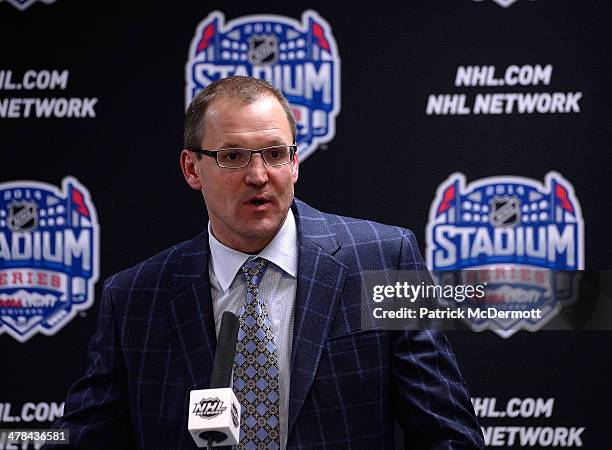 Head Coach Dan Bylsma of the Pittsburgh Penguins talks with the media after a 5-1 loss to the Chicago Blackhawks during the 2014 NHL Stadium Series...