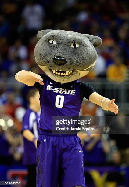 The Kansas State Wildcats mascot performs during the Big 12 Basketball Tournament quarterfinal game between the Kansas State Wildcats and the Iowa...