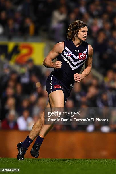 Nathan Fyfe of the Fremantle Dockers celebrates a goal during the 2015 AFL round thirteen match between the Fremantle Dockers and the Collingwood...