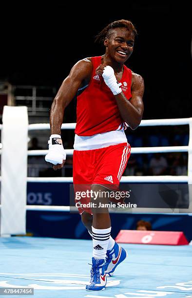 Nicola Adams of Great Britain celebrates winning gold against Sandra Drabik of Poland in the Women's Flyweight 48-51kg final during day thirteen of...