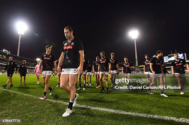 Travis Cloke of the Collingwood Magpies leaves the arena after the warmup during the 2015 AFL round thirteen match between the Fremantle Dockers and...