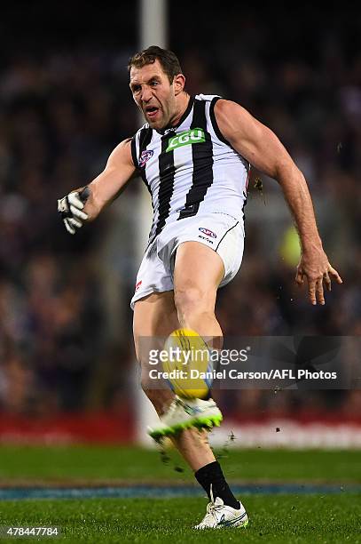 Travis Cloke of the Collingwood Magpies kicks into attack during the 2015 AFL round thirteen match between the Fremantle Dockers and the Collingwood...