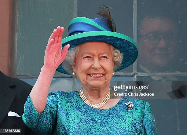 Queen Elizabeth II waves from the balcony of the city hall on June 25, 2015 in Frankfurt am Main, Germany. The Queen and Prince Philip have travelled...