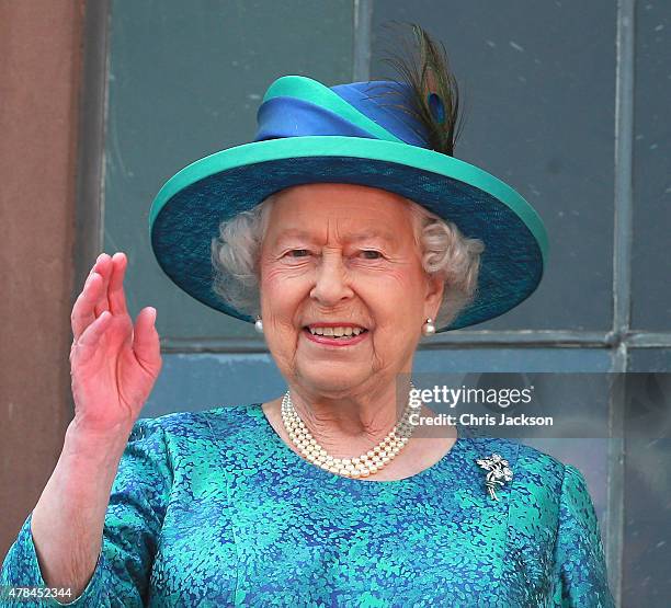 Queen Elizabeth II waves from the balcony of the city hall on June 25, 2015 in Frankfurt am Main, Germany. The Queen and Prince Philip have travelled...