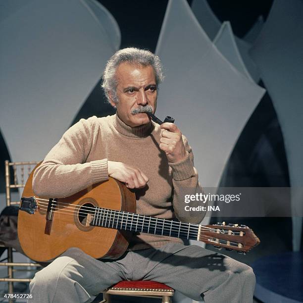 Georges Brassens on the set ""Number one"" realized by Jacques Brialy