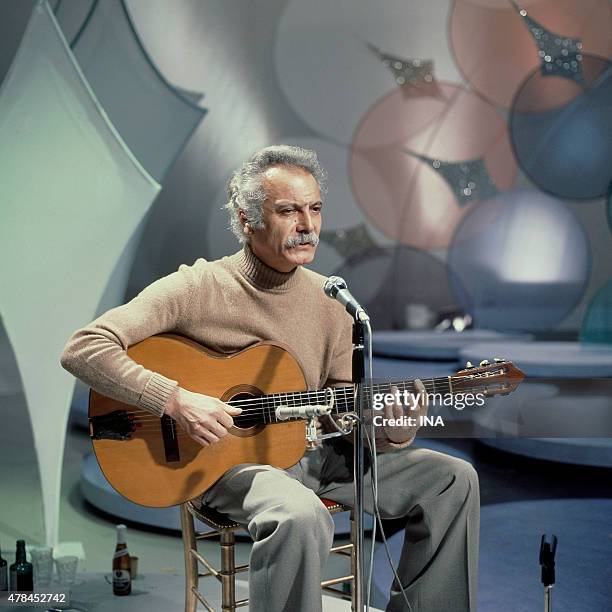 Georges Brassens on the set ""Number one"" realized by Jacques Brialy