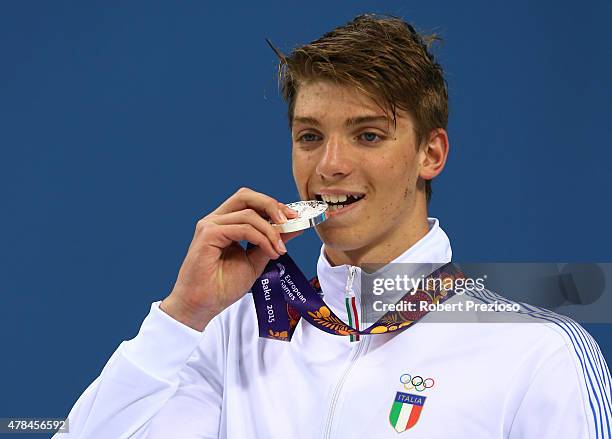 Alessandro Miressi of Italy stands on the podium during the medal ceremony for the Men's 100m Freestyle final during day thirteen of the Baku 2015...