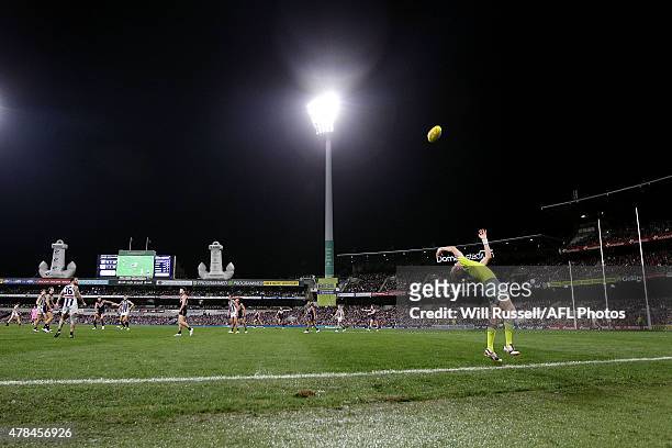 Boundary umpire throws the ball in during the round 13 AFL match between the Fremantle Dockers and the Collingwood Magpies at Domain Stadium on June...