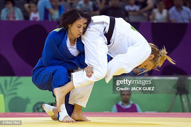 Belgium's Charline van Snick competes against Turkey's Ebru Sahin during their women's -48kg judo final match at the 2015 European Games in Baku on...