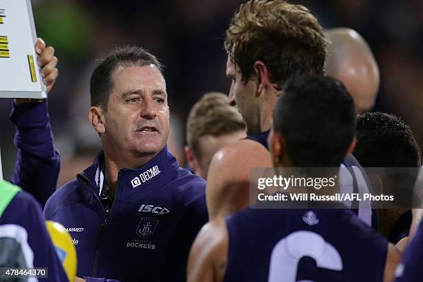 Dockers coach Ross Lyon addresses the players at the quarter time break during the round 13 AFL match between the Fremantle Dockers and the...