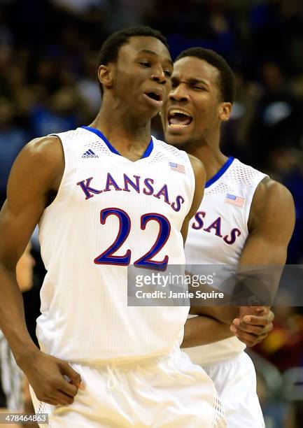 Andrew Wiggins of the Kansas Jayhawks is congratulated by Wayne Selden, Jr. #1 after dunking on an alley-oop during the Big 12 Basketball Tournament...