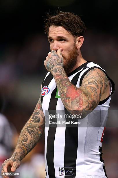 Dane Swan of the Magpies looks on during the round 13 AFL match between the Fremantle Dockers and the Collingwood Magpies at Domain Stadium on June...