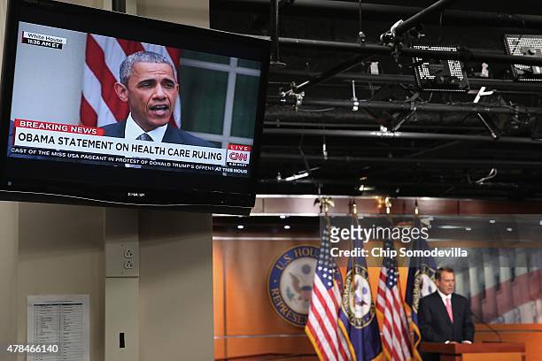 Speaker of the House John Boehner holds his weekly news conference at the same time President Barack Obama appears on television to make a statement...