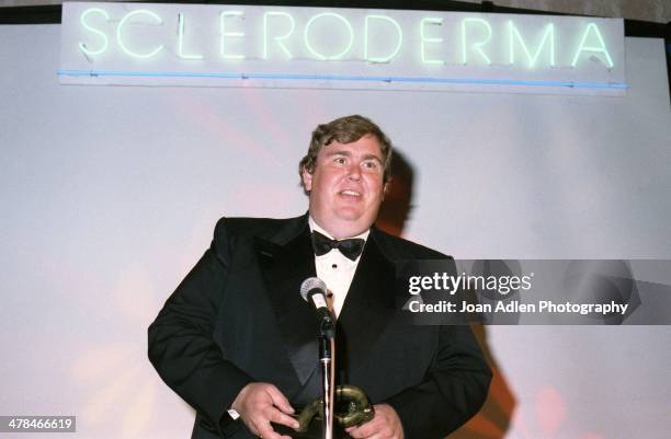 Actor John Candy receives the Founders Award from the Scleroderma Research Foundation at the 4th annual foundation's benefit dinner on June 09, 1991...