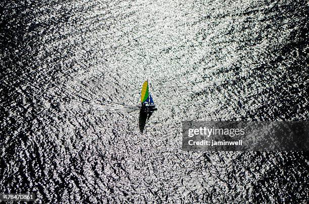 colourful sailboat and ocean - catamaran sailing stock pictures, royalty-free photos & images