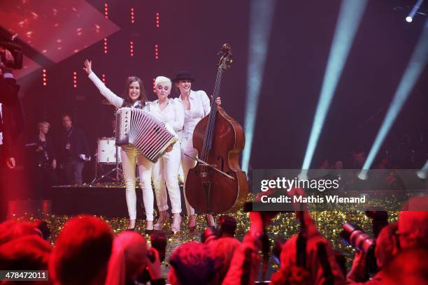 Elaiza celebrate during the TV Show 'Eurovision Song Contest - Unser Song fuer Daenemark 2014' at Lanxess Arena on March 13, 2014 in Cologne,...