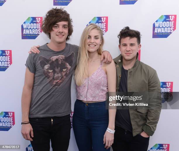 Musicians Dominic "Dot" Major, Hannah Reid, and Dan Rothman, of London Grammar, attend the 2014 mtvU Woodie Awards and Festival on March 13, 2014 in...