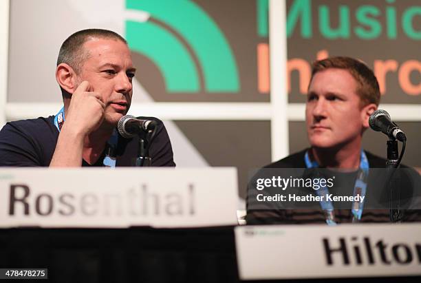 Jay Rosenthal of the National Music Publishers' Association and recording artist Eric Hilton of Thievery Corporation speak onstage at "Love the Art,...