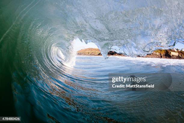 powerful ocean wave - surf tube stock pictures, royalty-free photos & images