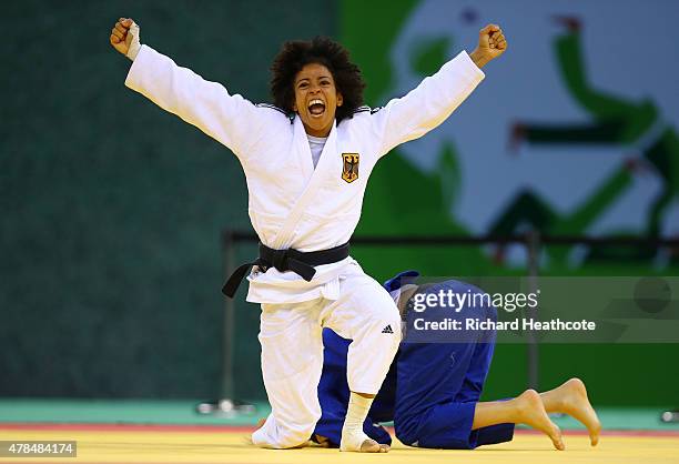 Miryam Roper of Germany celebrates victory over Automne Pavia of France in the Women's Judo -57kg Bronze Final during day thirteen of the Baku 2015...