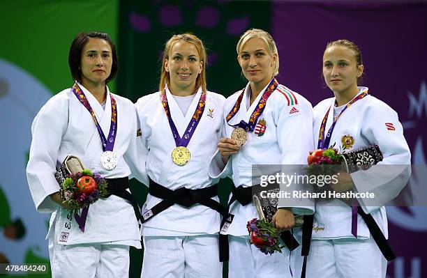 Silver medalist Ebru Sahin of Turkey, gold medalist Charline van Snick of Belgium, bronze medalist Eva Csernoviczki of Hungary and bronze medalist...