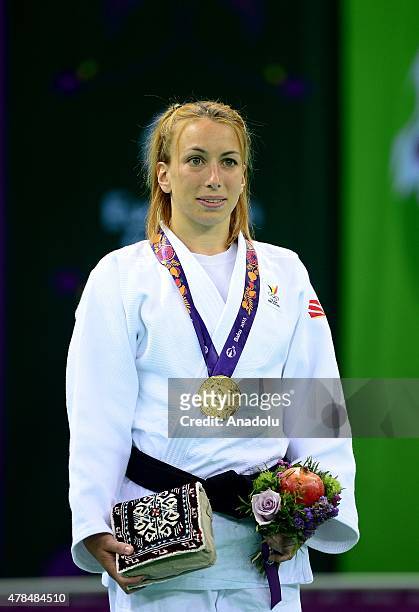 Gold medalist Belgium's Charline van Snick poses after their women's -48kg judo final match with Turkey's Ebru Sahin at the Baku 2015 European Games,...
