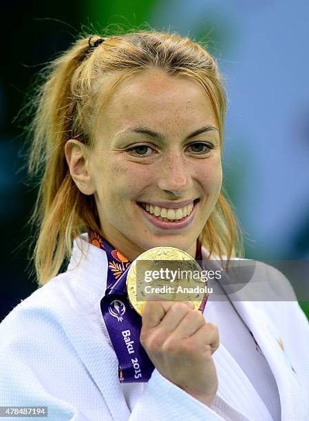 Gold medalist Belgium's Charline van Snick poses after their women's -48kg judo final match with Turkey's Ebru Sahin at the Baku 2015 European Games,...