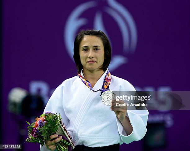 Silver medalist Turkey's Ebru Sahin poses after their women's -48kg judo final match with Belgium's Charline van Snick at the Baku 2015 European...