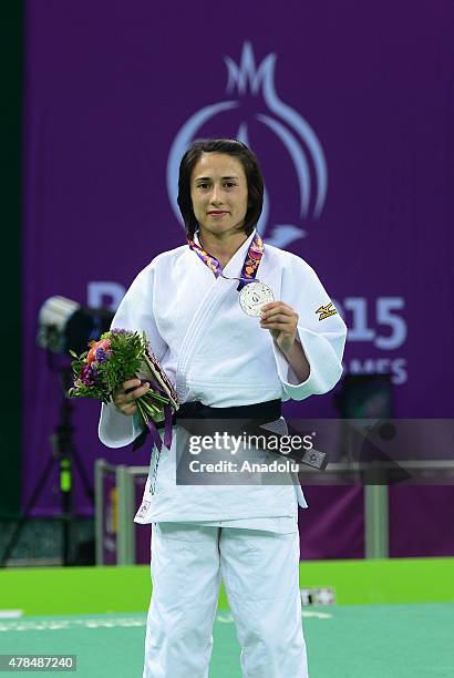 Silver medalist Turkey's Ebru Sahin poses after their women's -48kg judo final match with Belgium's Charline van Snick at the Baku 2015 European...