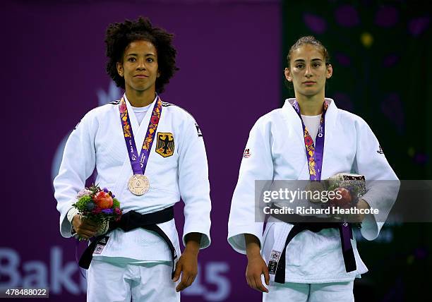 Bronze medalist Miryam Roper of Germany and Nora Gjakova of Kosovo pose on the medal podium following the Women's Judo -57kg Finals during day...