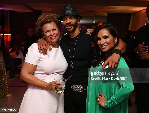 Chairman and CEO Debra L. Lee, actor Aaron D. Spears and Estela Lopez Spears attend the 2015 BET Awards Debra Lee Pre-Dinner at Sunset Tower Hotel on...